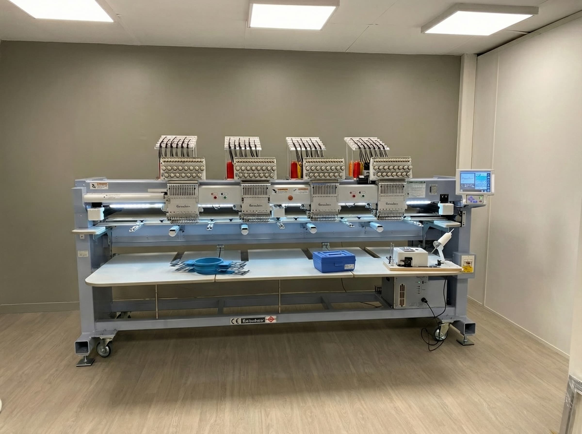 Machine de broderie Barudan 4 têtes dans l'atelier EQUIP'A à Herblay-sur-Seine